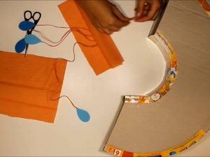 como hacer piñatas con tiras de carton 12